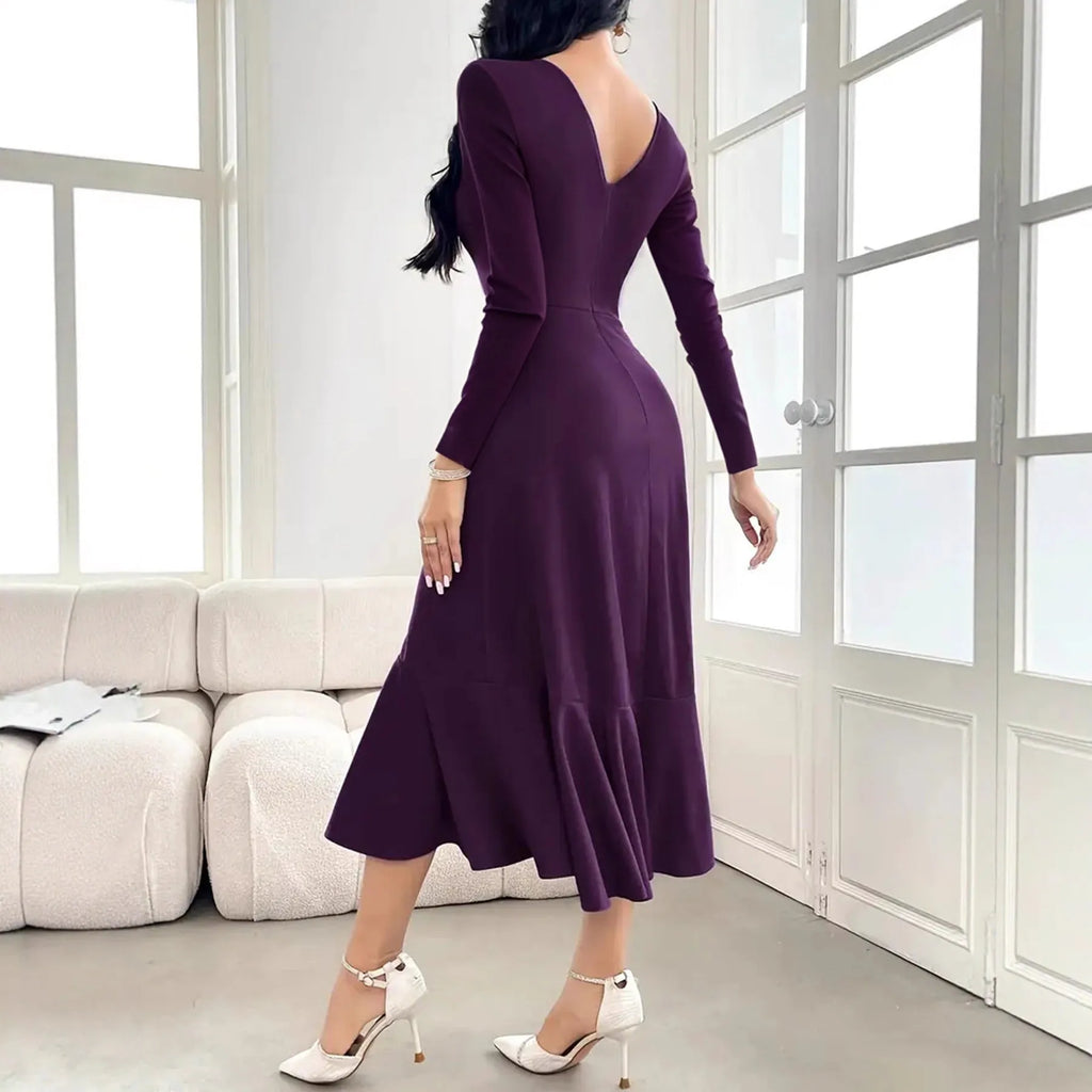 Purple women's long sleeve dress with round neck, mid waist, and ruffle details.