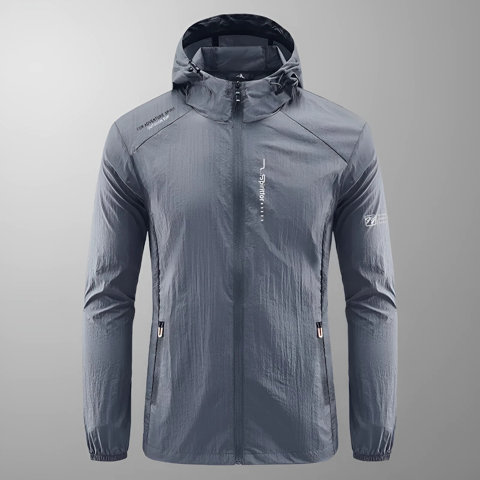 Man wearing a lightweight light grey hooded summer jacket made of thin nylon.
