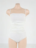 Sling style one-piece swimsuit with belly pleating in blue, white, yellow or black solid colours