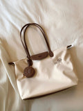 Large pink or white Oxford cloth tote bag with shoulder strap and internal mobile phone pocket