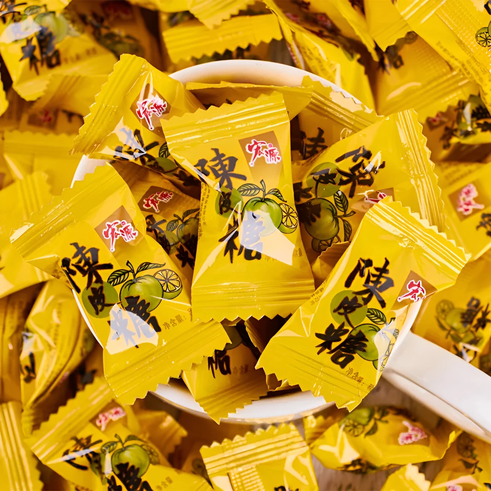 Three bags of hard candy: plum sugar, guava, and tangerine peel flavours in a 350g and 355g assortment pack.