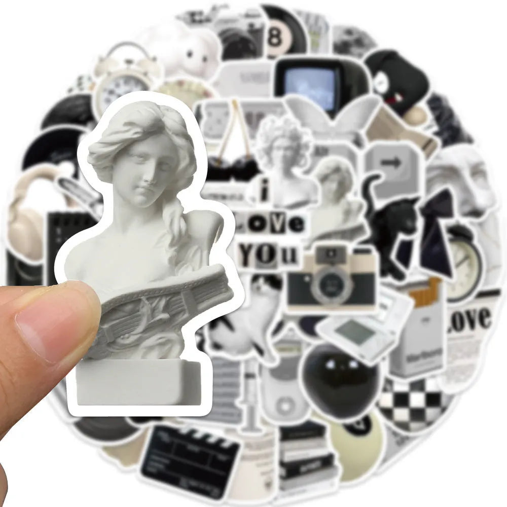 61 black and white PVC waterproof vinyl stickers for laptops, phones, and luggage.