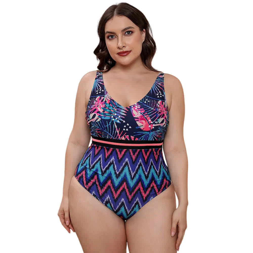 Women's striped spaghetti strap one-piece swimsuit in blue, white, or green printed patterns.
