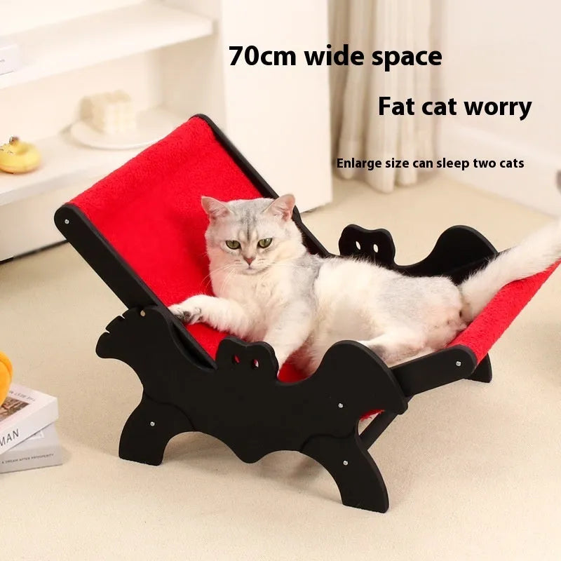 Wooden cat recliner lounge chair with black and red Halloween colour scheme