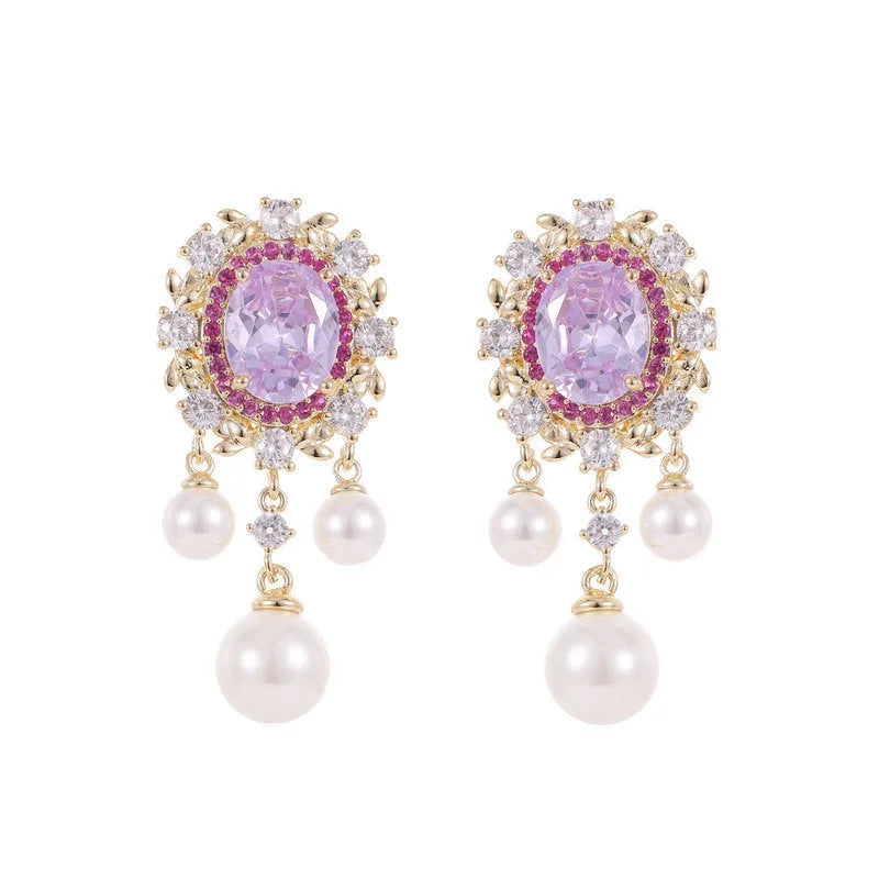 Oval zircon inlaid pearl tassel earrings with geometric design and decorative hanging elements