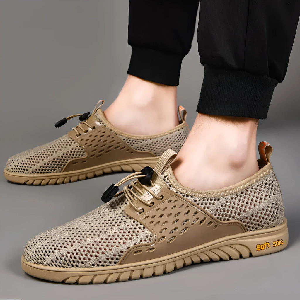 Men's breathable mesh casual shoe in sand colour with elastic band and rubber sole.