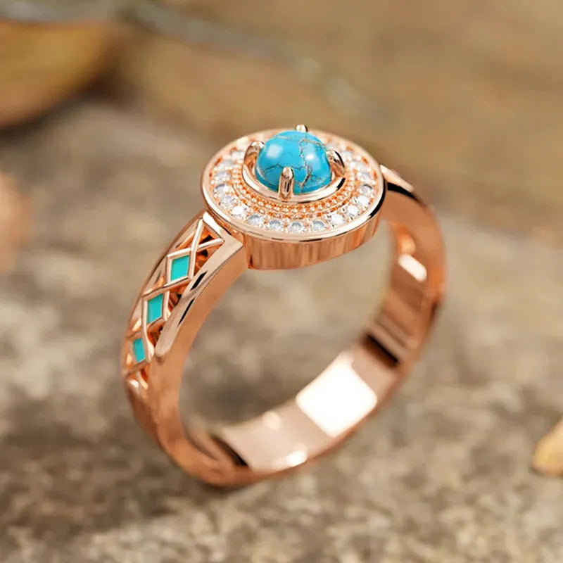 Women's turquoise ethnic style geometric copper ring with oil micro inlaid zircon in rose gold.