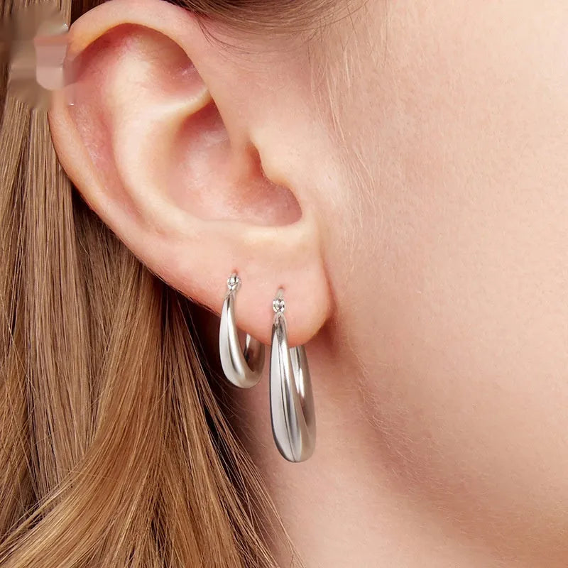 Geometric ring clip-on earrings with copper base and silver electroplated finish