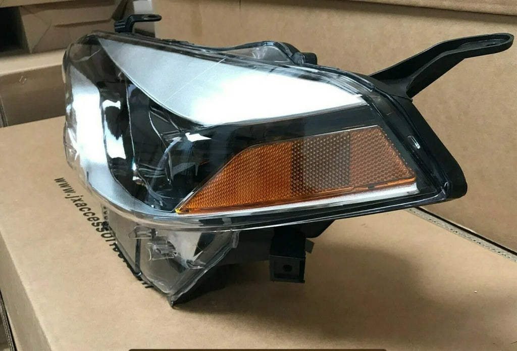 Halogen headlight assembly for passenger side of 2014-2016 Toyota Corolla with black housing.