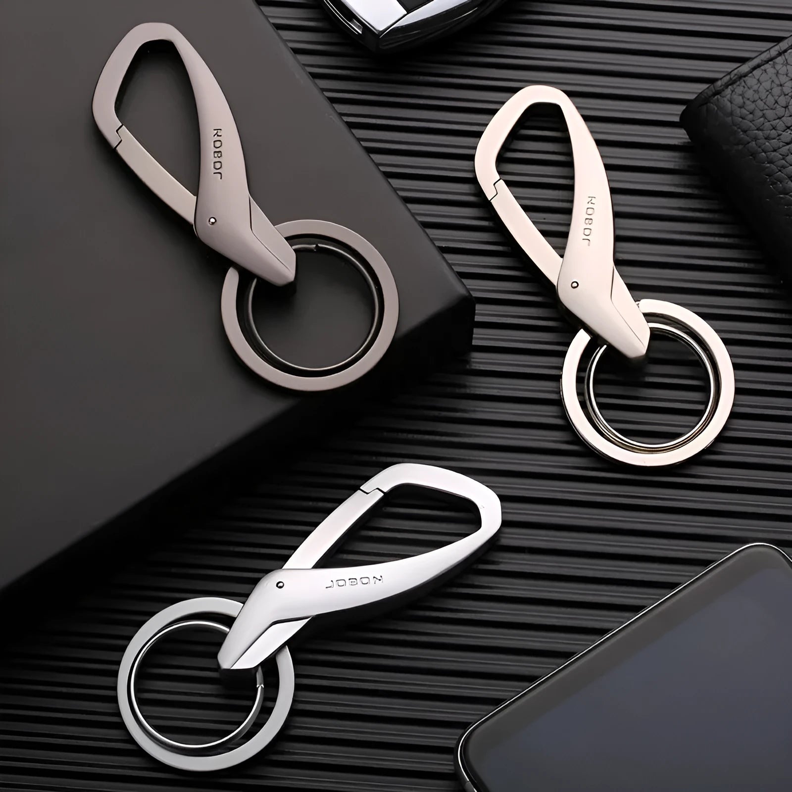 Zinc alloy double ring keychain in black, chrome or nickel colour measuring 8.3x3.5cm