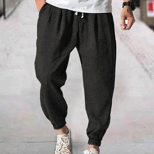 Men's loose fit cotton ankle banded casual pants in light green colour