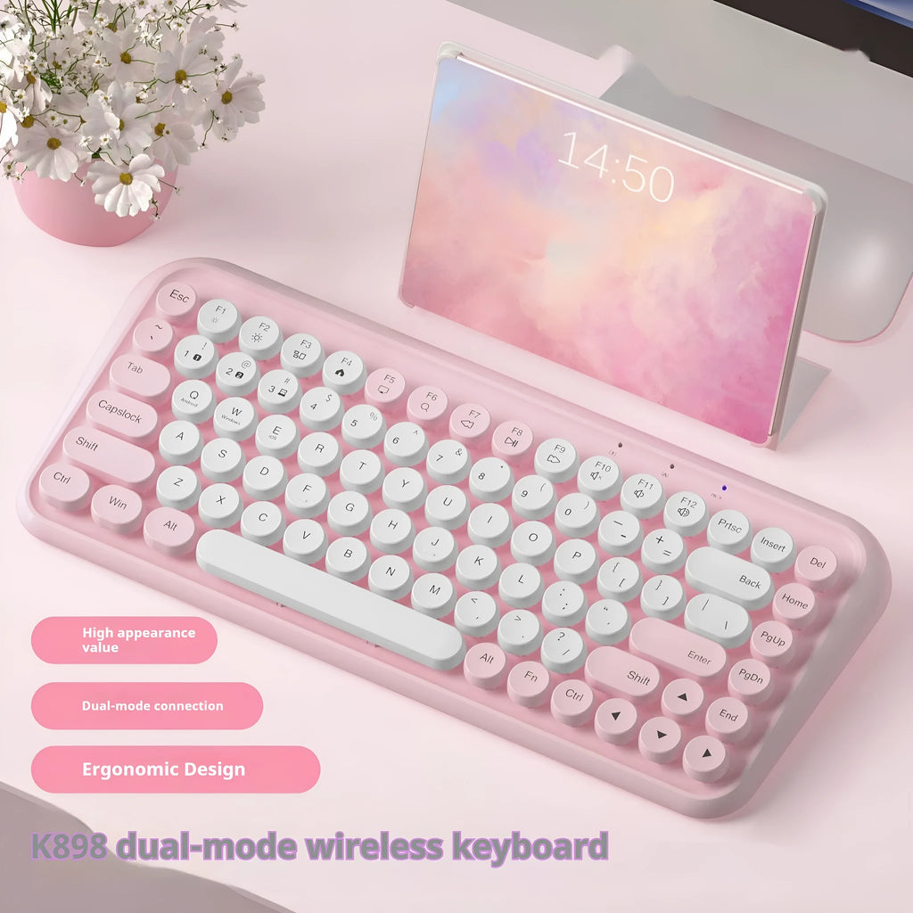 Pink wireless Bluetooth keyboard with 84 keys showing compact dimensions