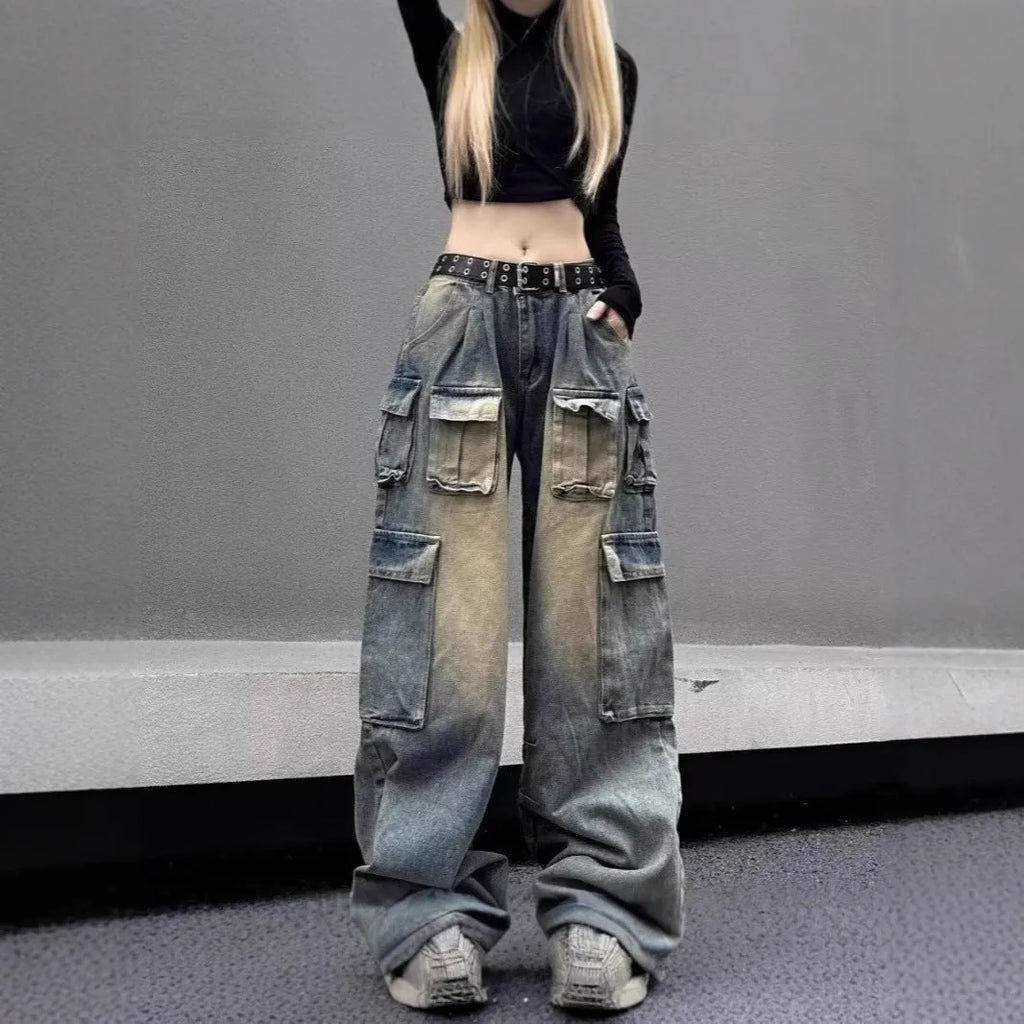 Men's loose fit straight leg distressed jeans with multiple pockets in light blue or black wash
