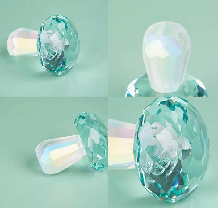 Colourful white crystal mushroom decoration in geometric modern style, 40mm by 53mm.