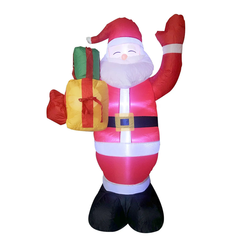 Christmas LED inflatable decoration of a glowing Santa Claus figure in a garden at night