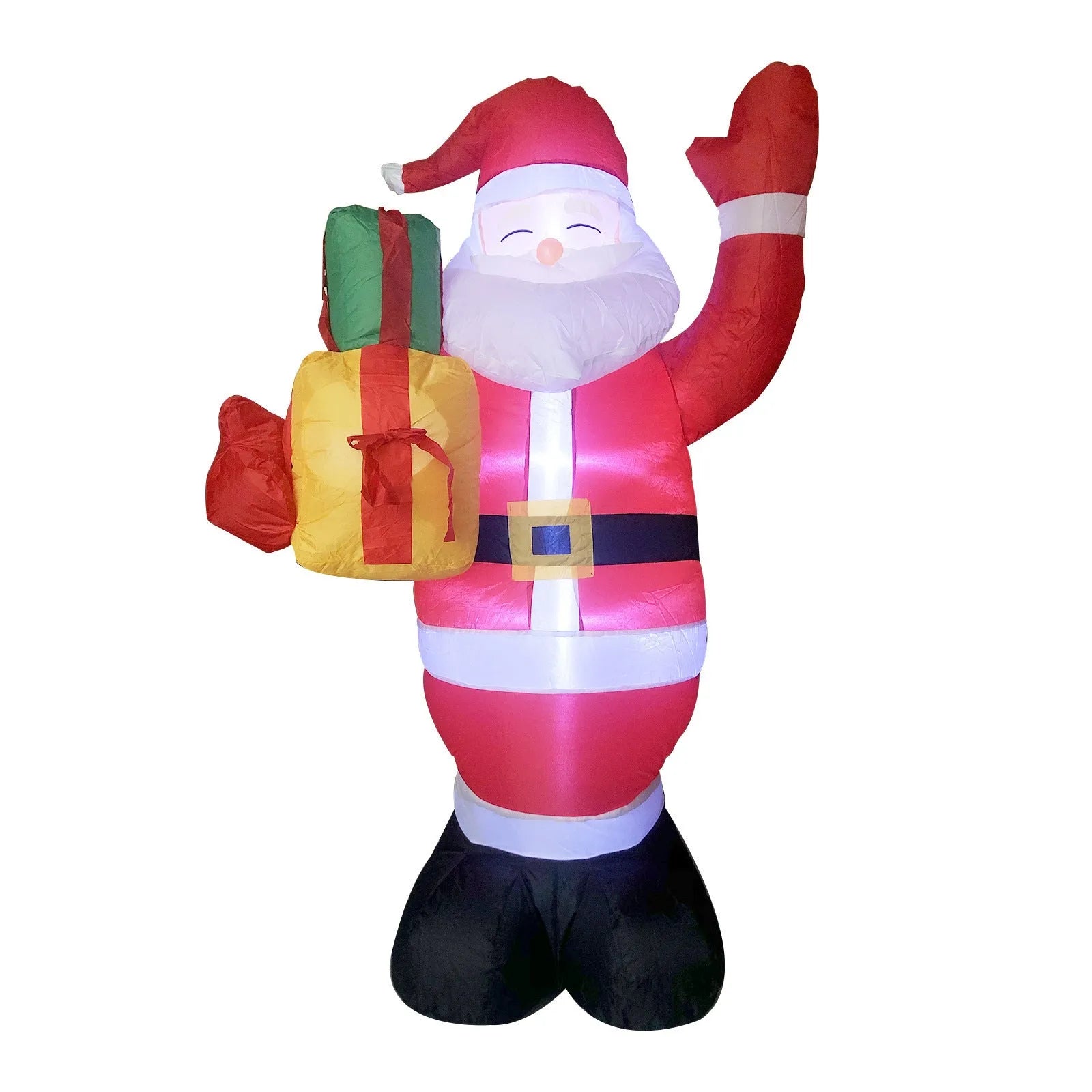 Christmas LED inflatable decoration of a glowing Santa Claus figure in a garden at night