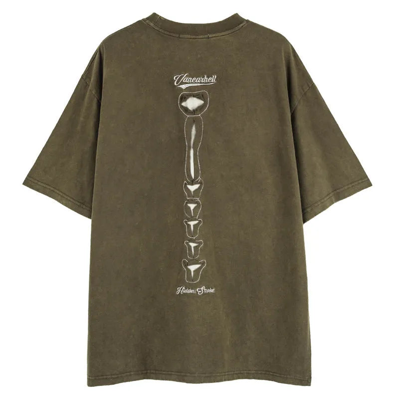 Black skull graphic short sleeve cotton T-shirt with drop shoulders on a hanger.