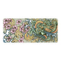 Gaming mouse pad with dragon artwork in multiple size options on desk