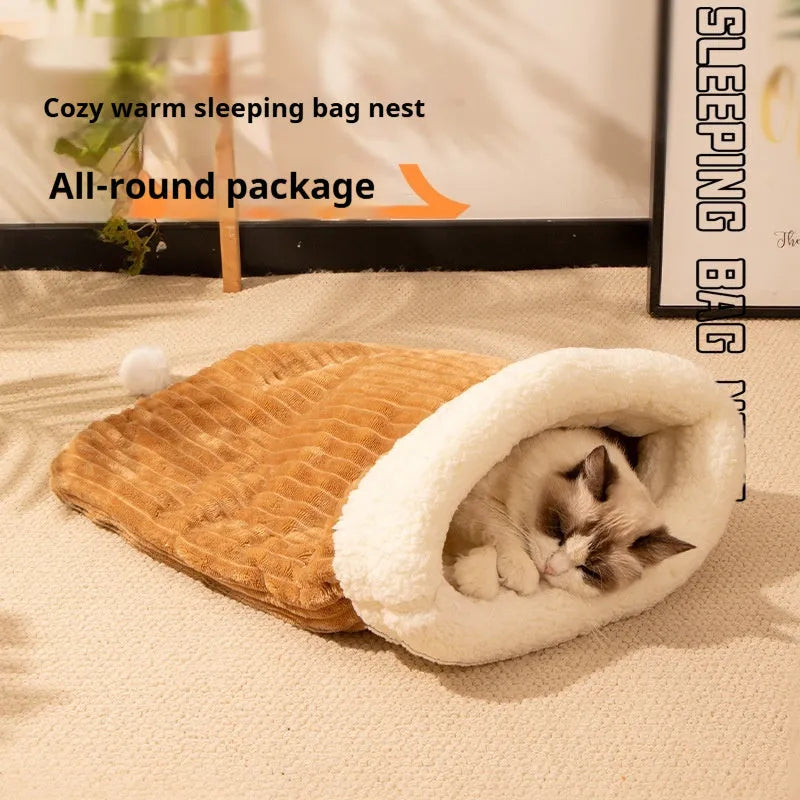 Flannel cat sleeping bag bed measuring 50 by 40 cm in a blue rabbit pattern