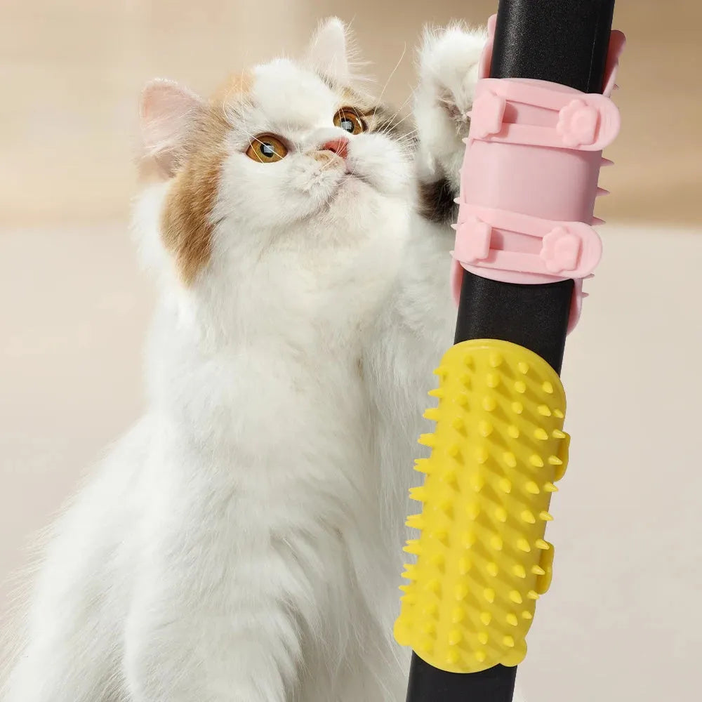 Silicone cat grooming comb with adjustable strap mounted on table leg