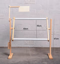 Solid pine wood vertical cross stitch embroidery frame with adjustable height mechanism in natural log colour