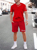 Sports style short-sleeved top and matching shorts set in solid colour on hanger