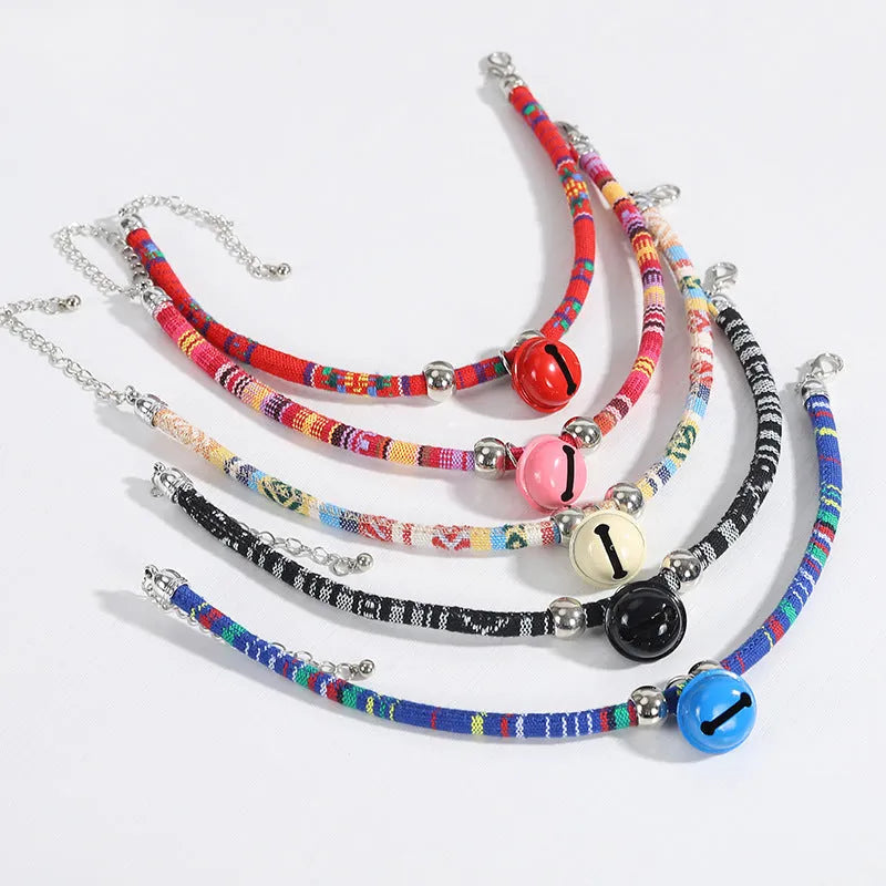 Adjustable ethnic pattern pet collar with metal bell for a cat or small dog