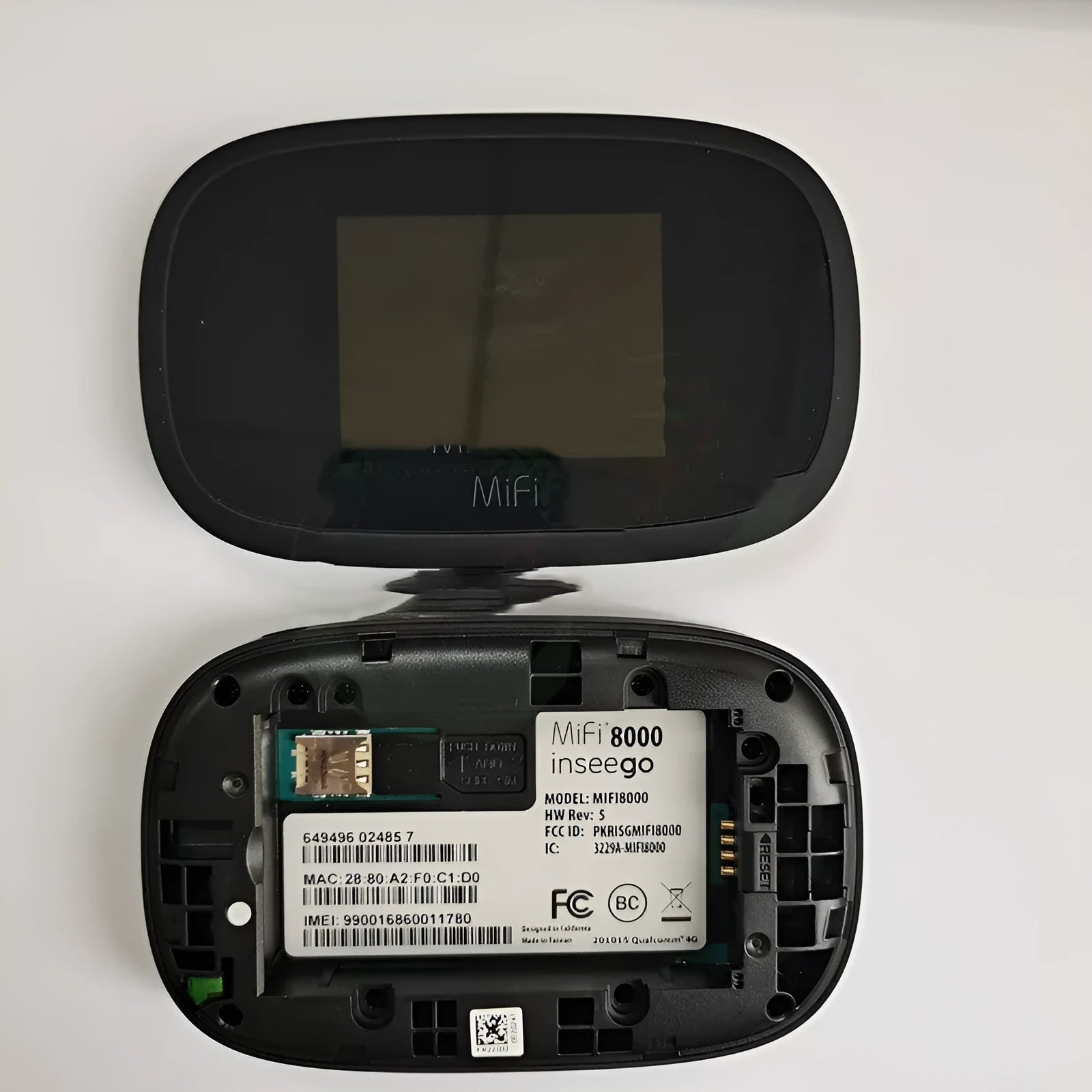 Black Full Network 4G portable wireless router on a white background.