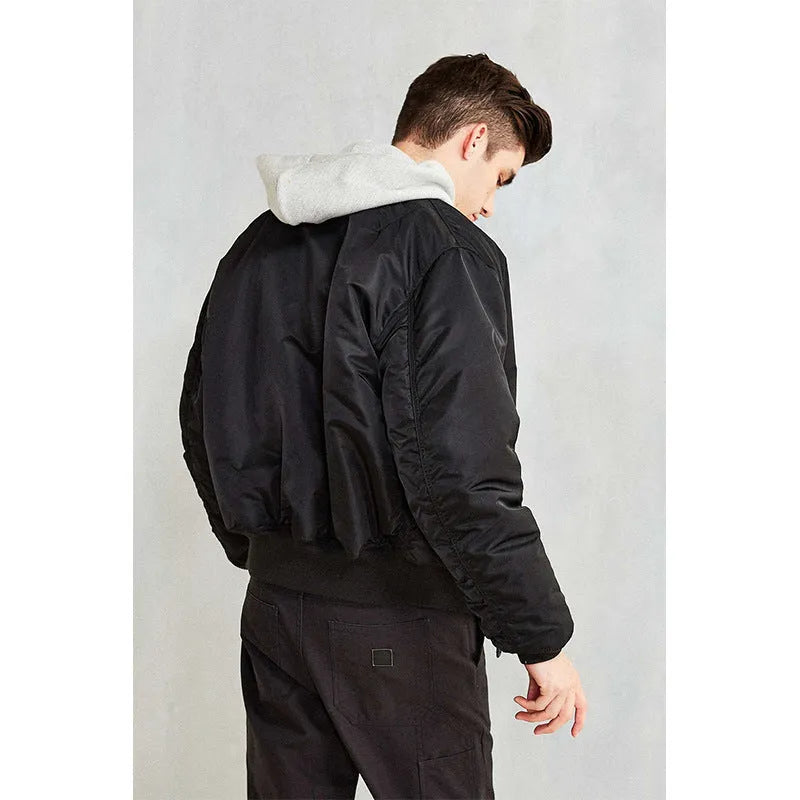 Men's loose-fit cotton-padded pilot jacket in army green, made from double-sided nylon fabric.