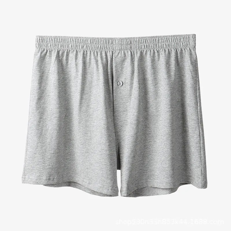 Men's pure cotton boxer shorts in light grey colour showing loose fit and high waist design