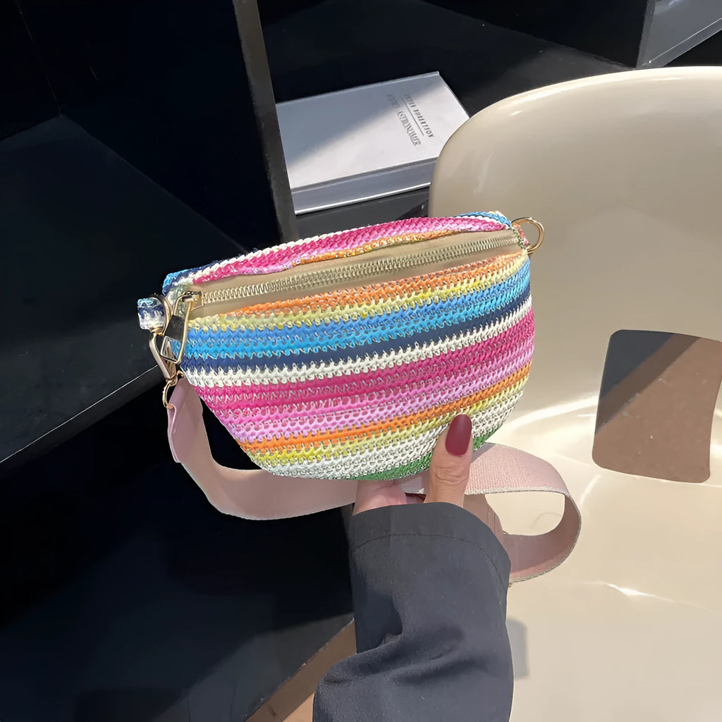 Bohemian woven straw beach bag with single strap in pink or blue showing sandwich pocket and shell shape
