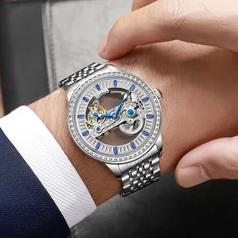 Men's luxury zircon mechanical watch on leather strap showing onion crown and transparent case back.