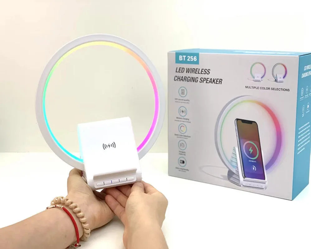 White Bluetooth speaker with wireless charging surface and ambient lighting, dimensions 225mm by 200mm