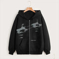 Unisex Y2K black zip hoodie with loose fit and attached hood, Korean streetwear style for teenagers