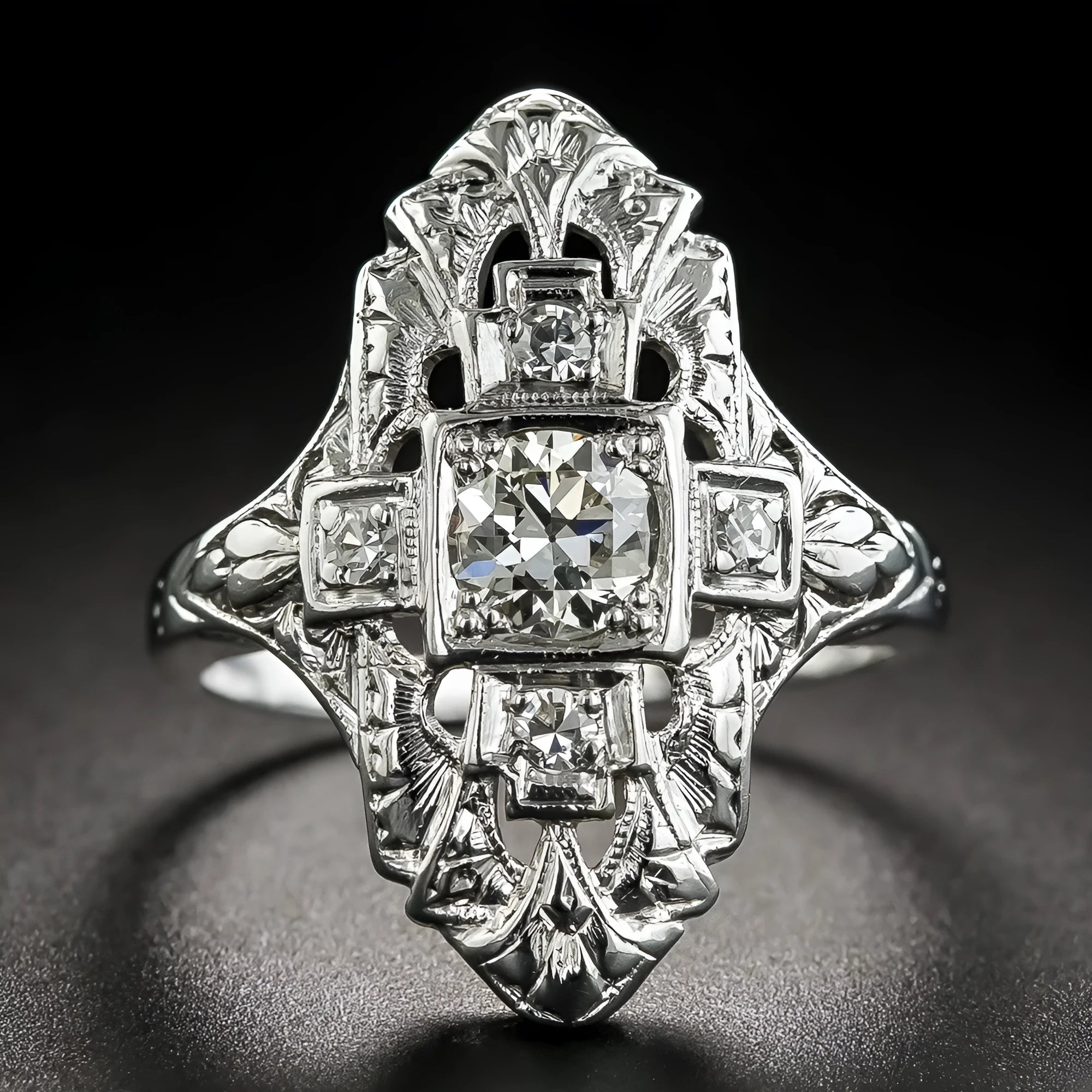 Silver electroplated copper ring with hollow-out geometry pattern and diamond studded detailing
