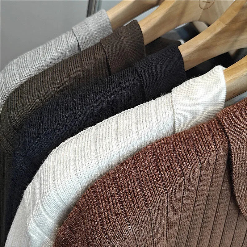 Male model wearing loose fit striped elastic knit sweater in modal and rabbit fur blend fabric