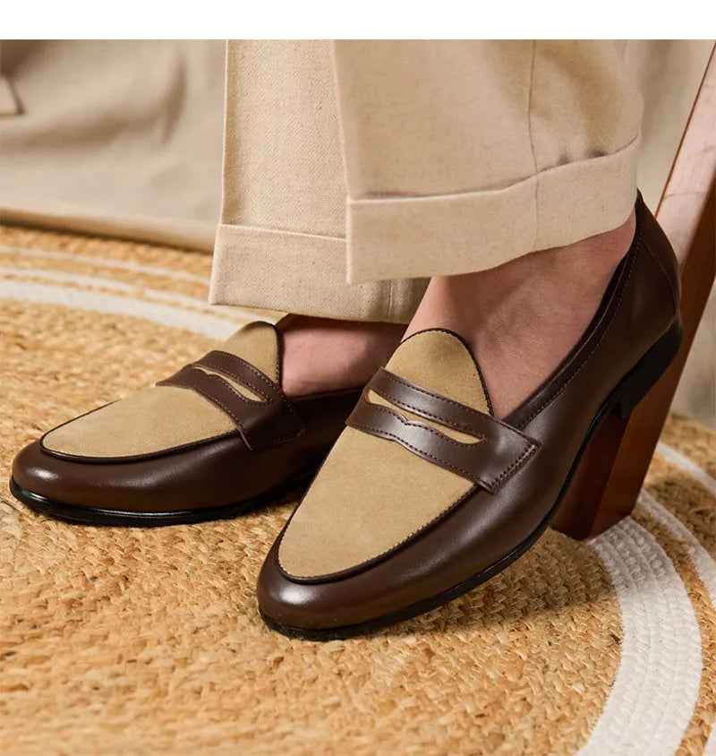 Coffee grey suede slip-on loafers with a rubber sole shown from the side.