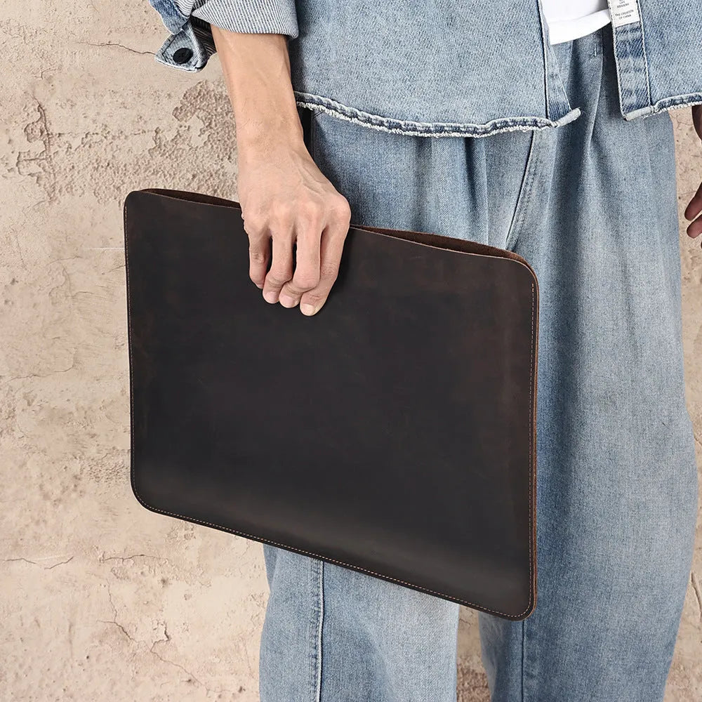 Horizontal computer liner bag in genuine crazy horse leather with organised compartments