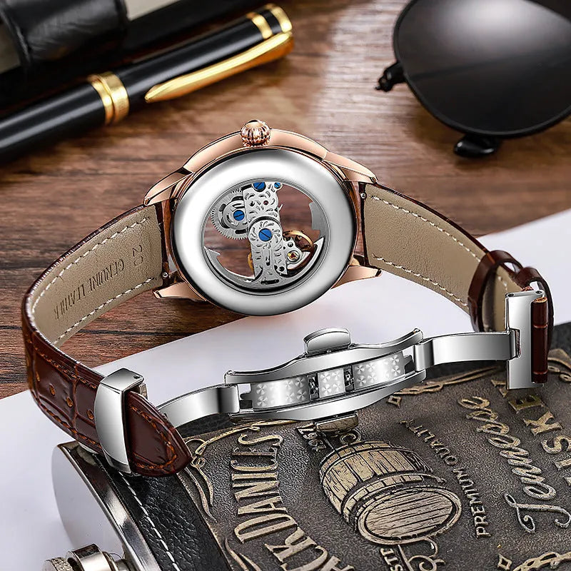 Men's luxury zircon mechanical watch on leather strap showing onion crown and transparent case back.