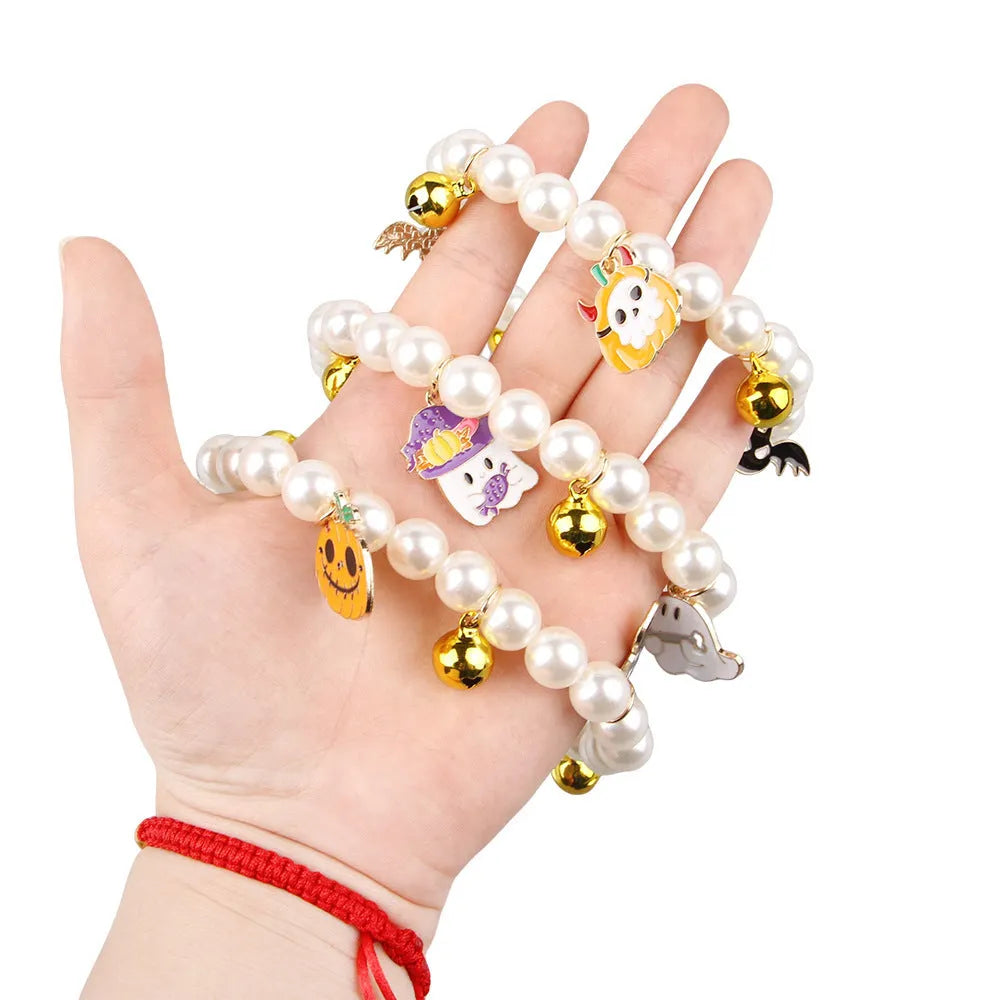 Purple Halloween cat collar with simulated pearl necklace and pumpkin ghost design for pets