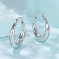 Geometric ring clip-on earrings with copper base and silver electroplated finish