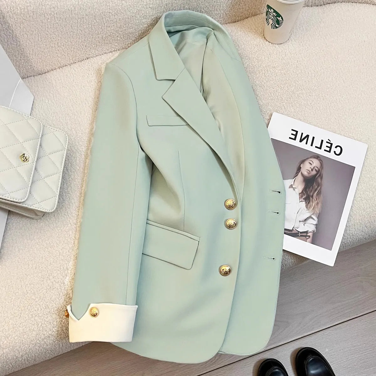 Korean style women's loose fit coat in beige colour with 65cm medium length and pocket detailing