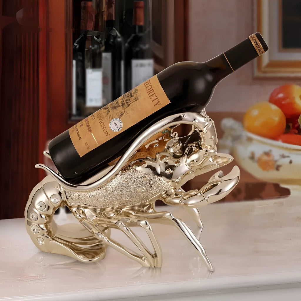Lobster-shaped wine rack ornament in metallic rose gold or silver finish displaying wine bottle
