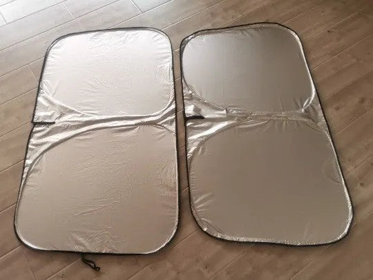 Titanium silver aluminium foil car sunshade for windshield heat and UV protection.
