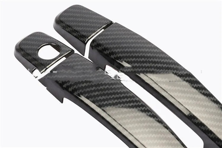 Carbon fibre pattern door handle cover for Opel Vauxhall Astra H and J models.