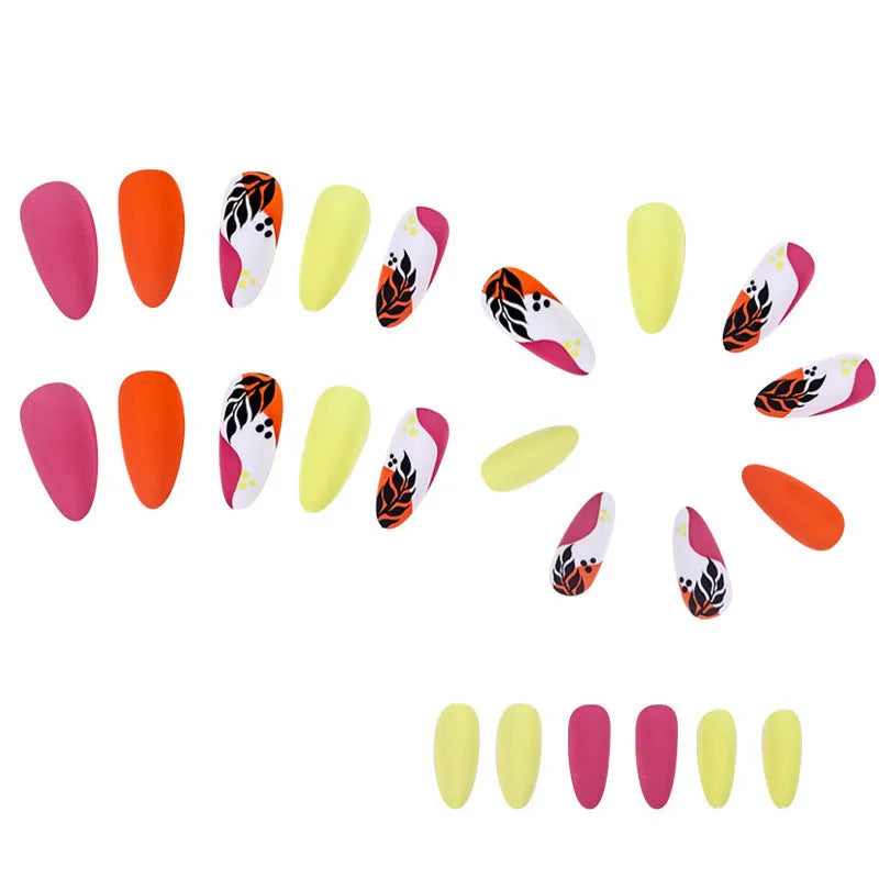 Wear Armour medium almond shaped nail stickers in four frosted patterns: French leaves, leopard print, macarons, and colour plating.