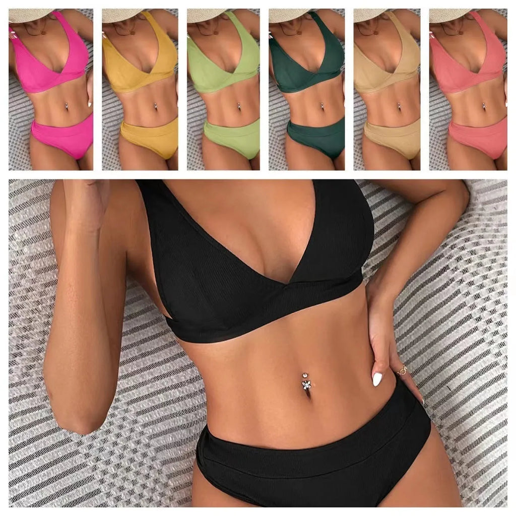 Women's black bikini with a rib texture and a front lace-up split design on a mannequin.