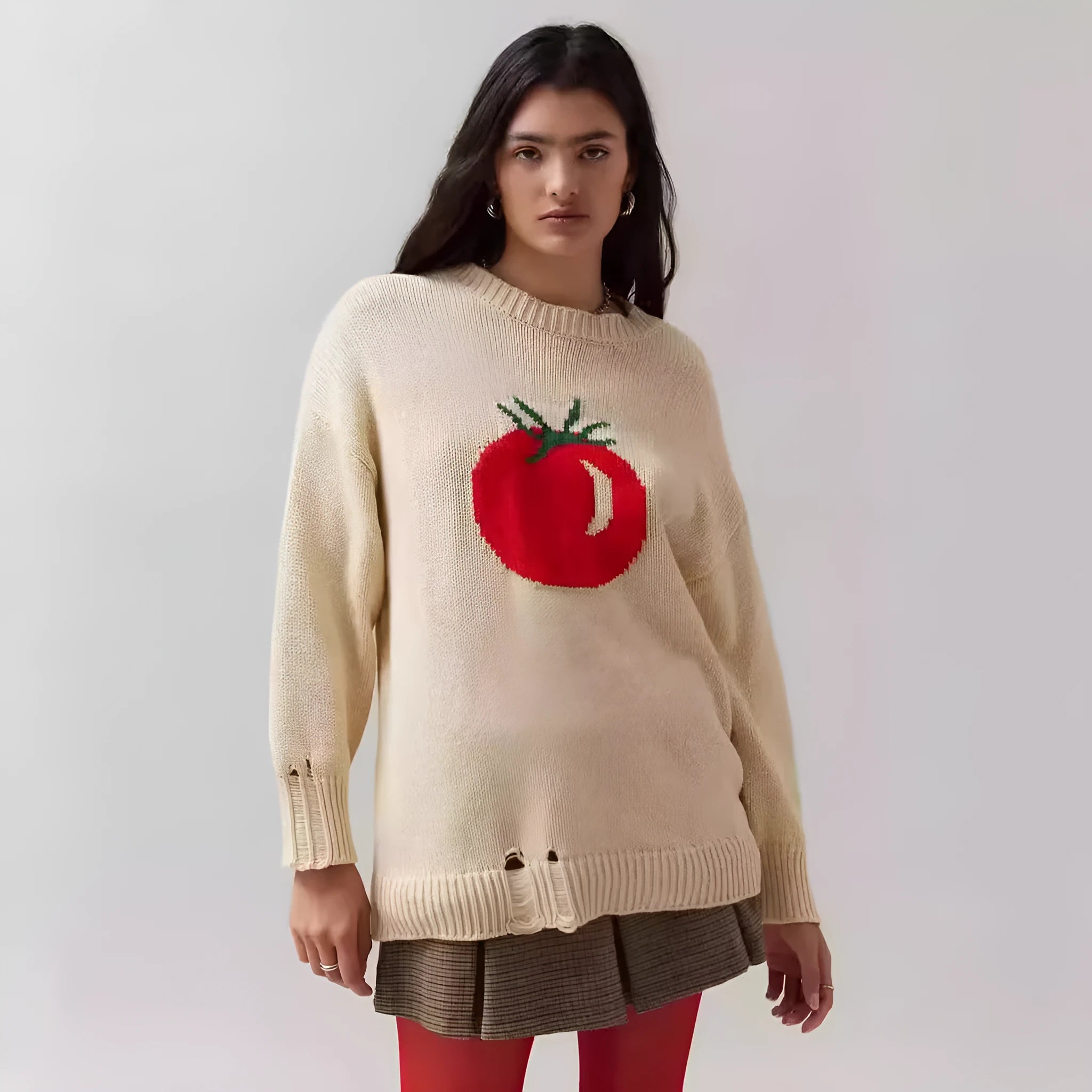 Women's milky white acrylic jacquard pullover sweater with round neck and long sleeves laid flat.