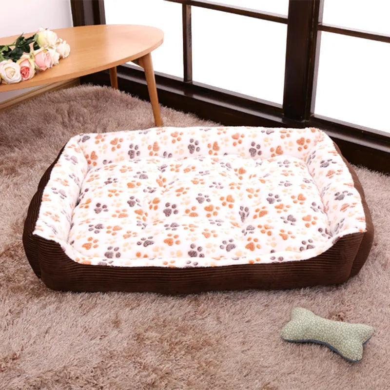 Beige plush pet dog bed with raised sides, shown next to a small dog.
