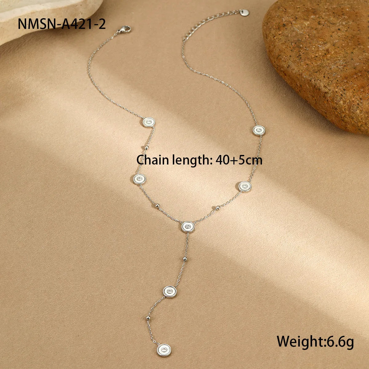 Stainless steel bracelet and necklace set with 18K gold plating and geometric fritillary design